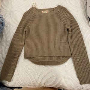 Cute brown sweater.